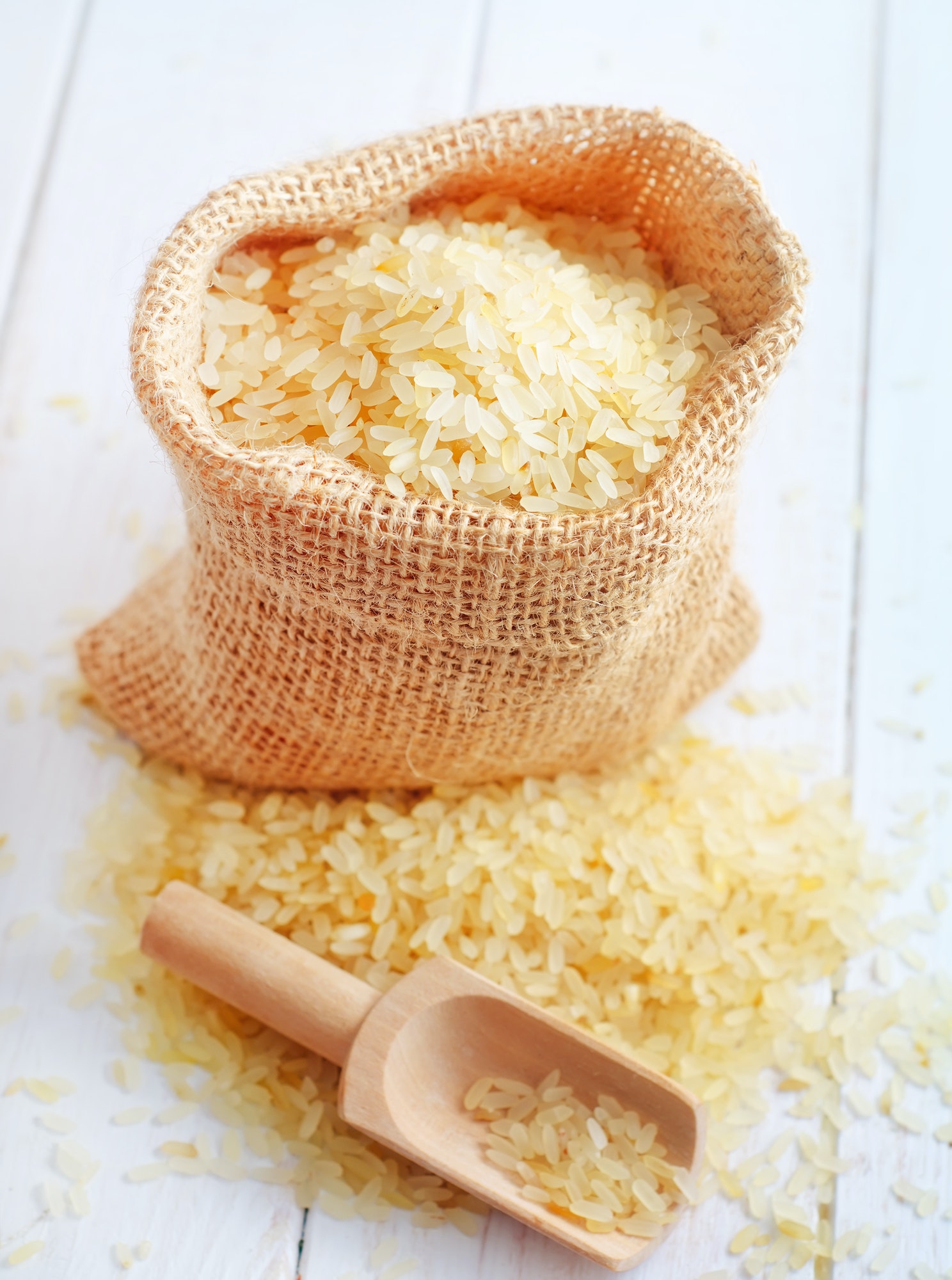 Raw rice on the table, portion of the raw rice